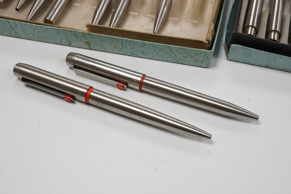 A quantity of Parker 25 fountain pens and ballpen spares including rare orange parts